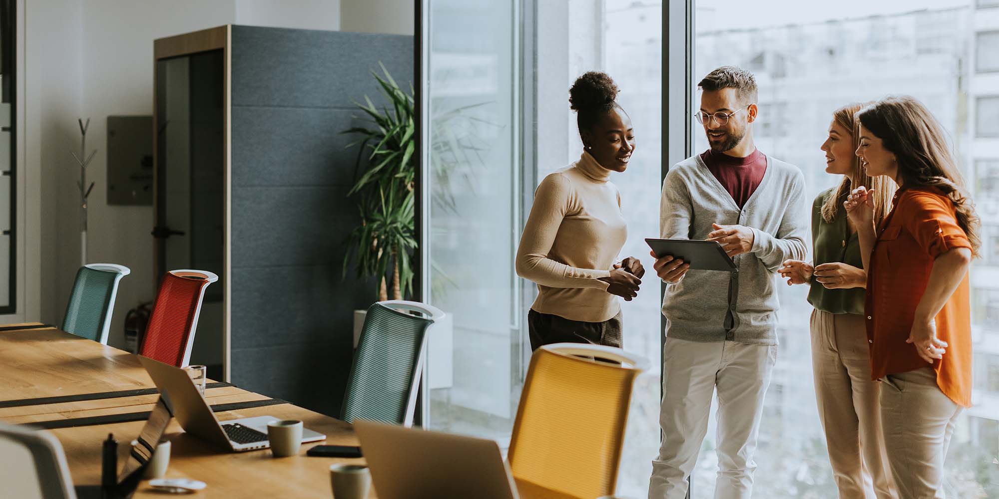 Young multiethnic startup team working in the modern office