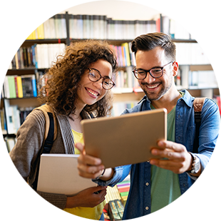 two people looking at a tablet together
