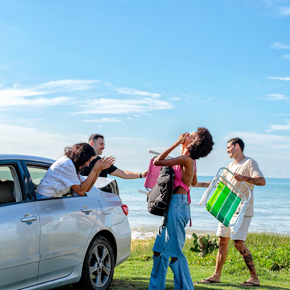 group of people packing the car