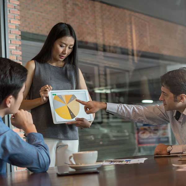 woman presenting a graph