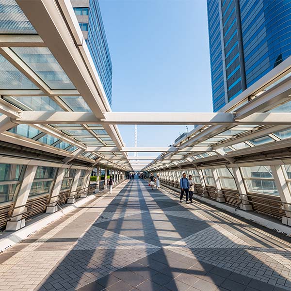 Pedestrian walkway between modern office buildings