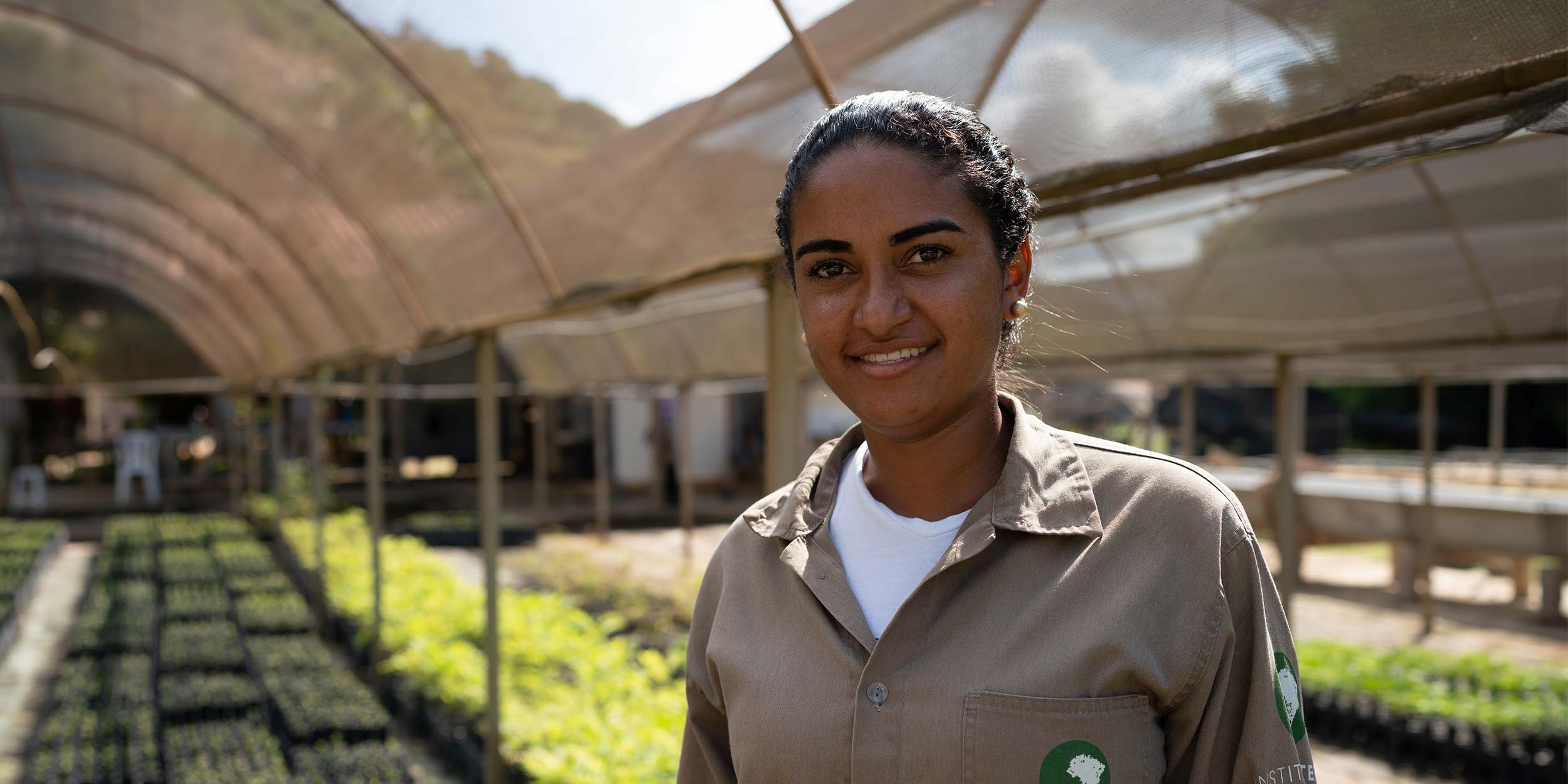 woman from instituto terra in a greenhouse