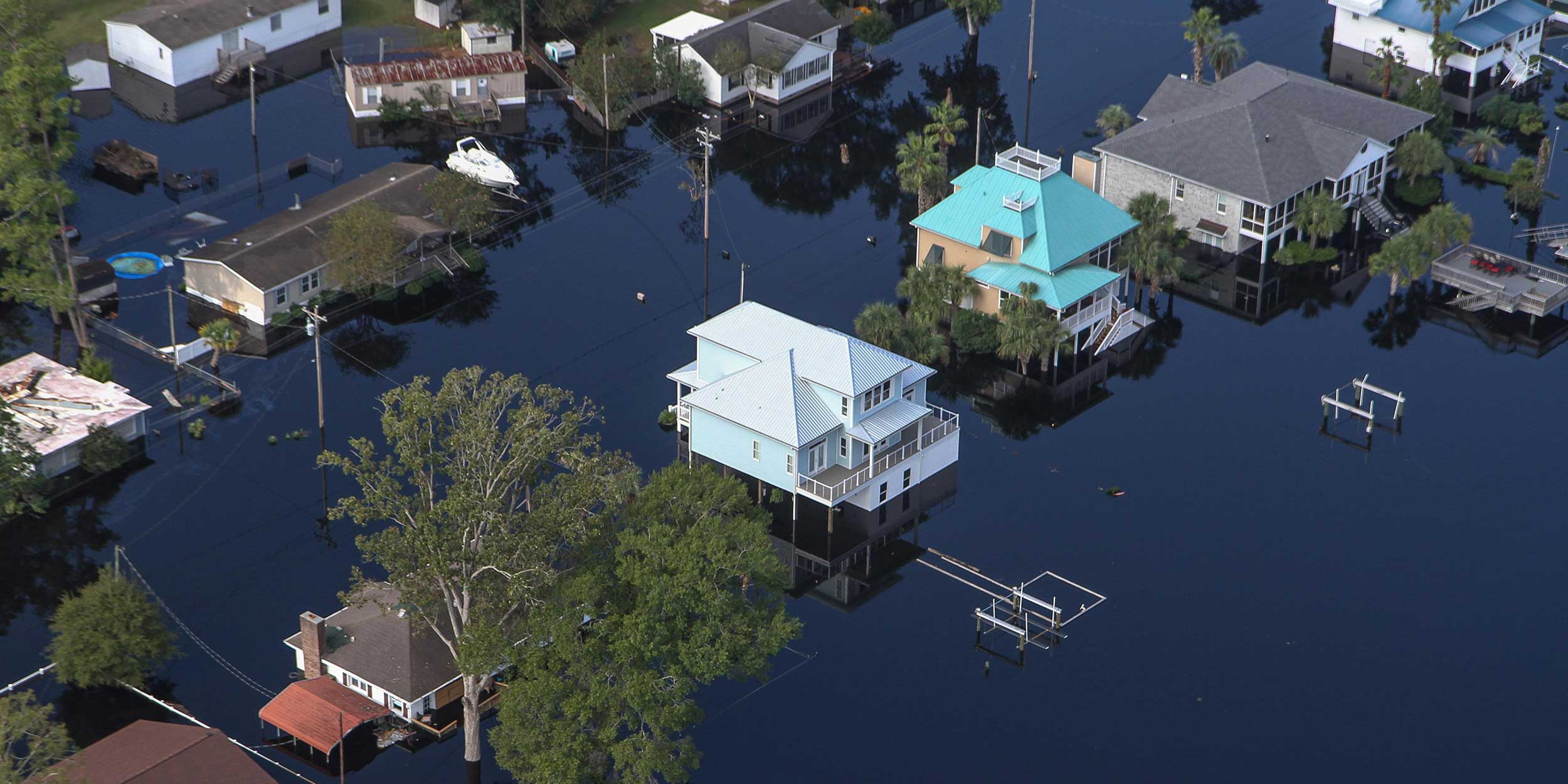 stage houses in flood