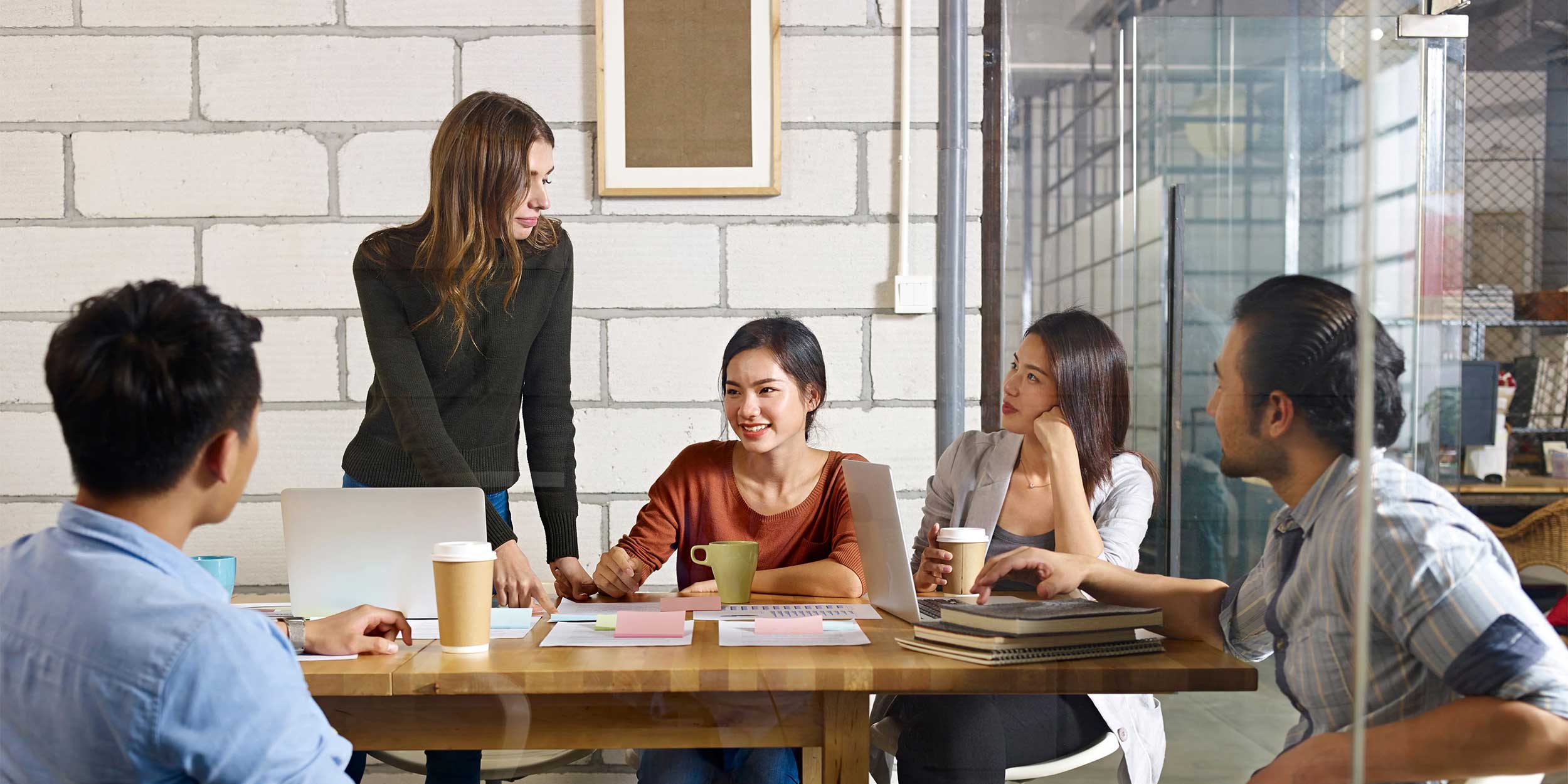 colleagues sitting around a table