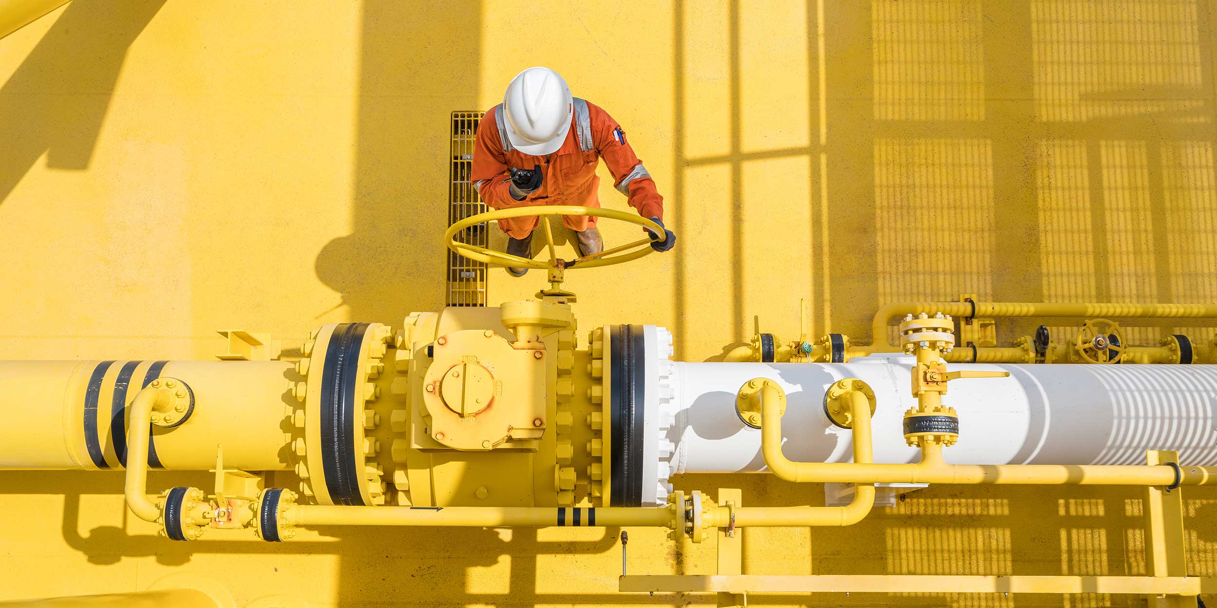 engineer working on pipe
