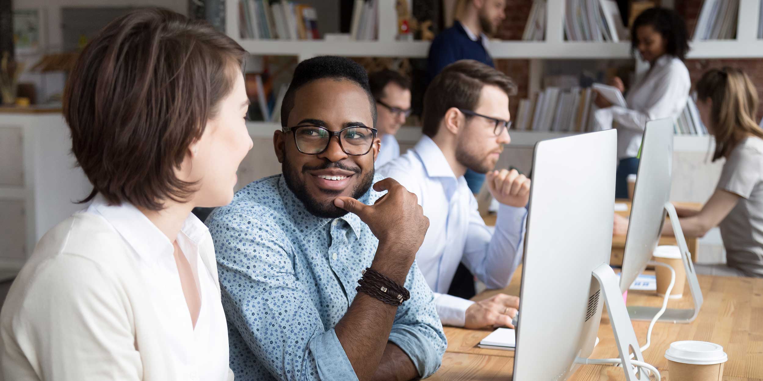 people in front of computer