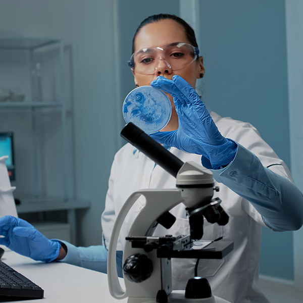 Scientist analyzing a sample in a laboratory