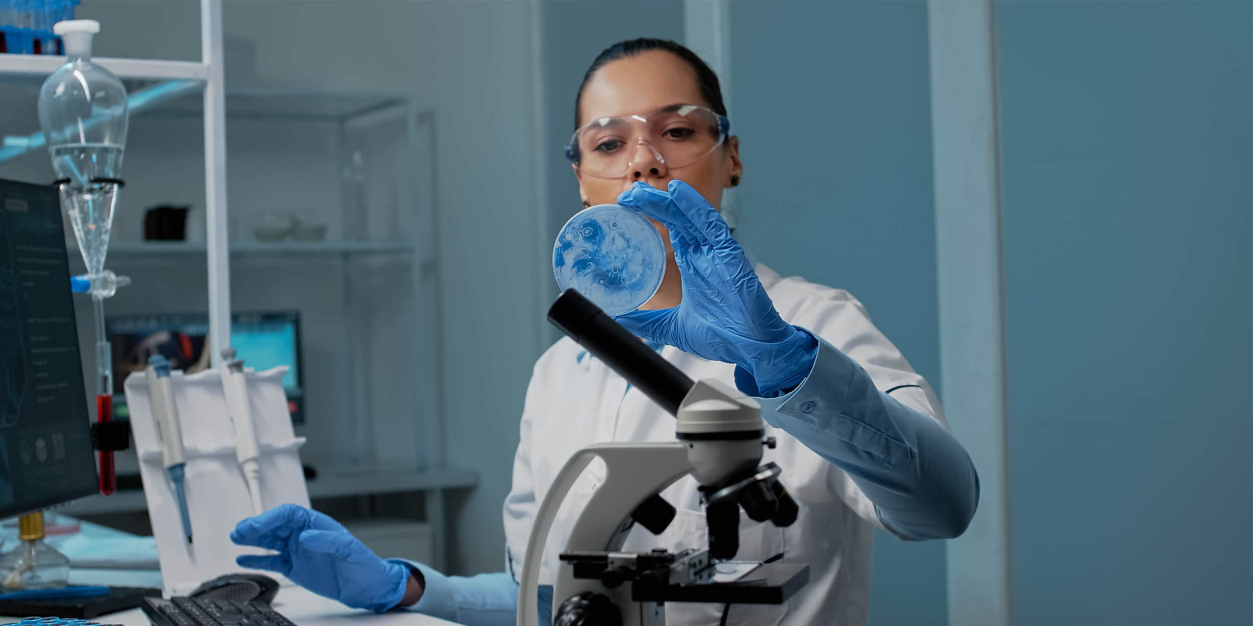 Scientist analyzing a sample in a laboratory