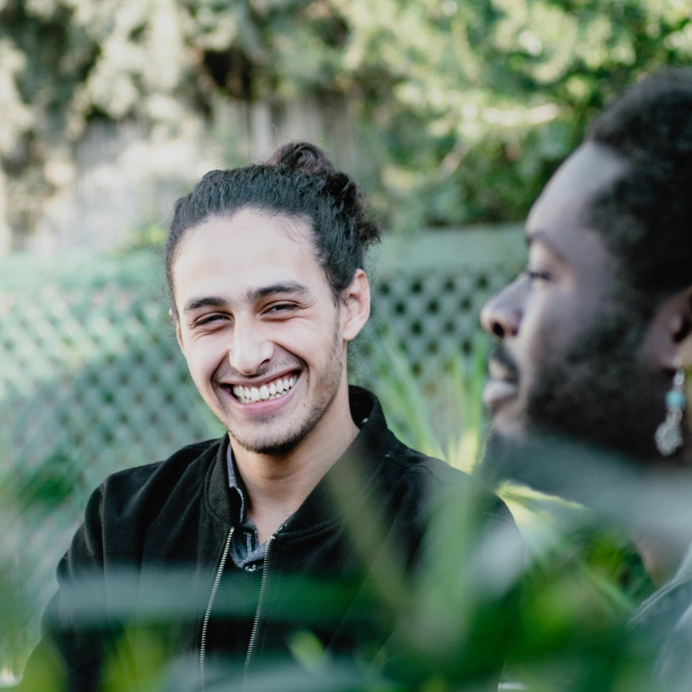 adult and two children using tablet