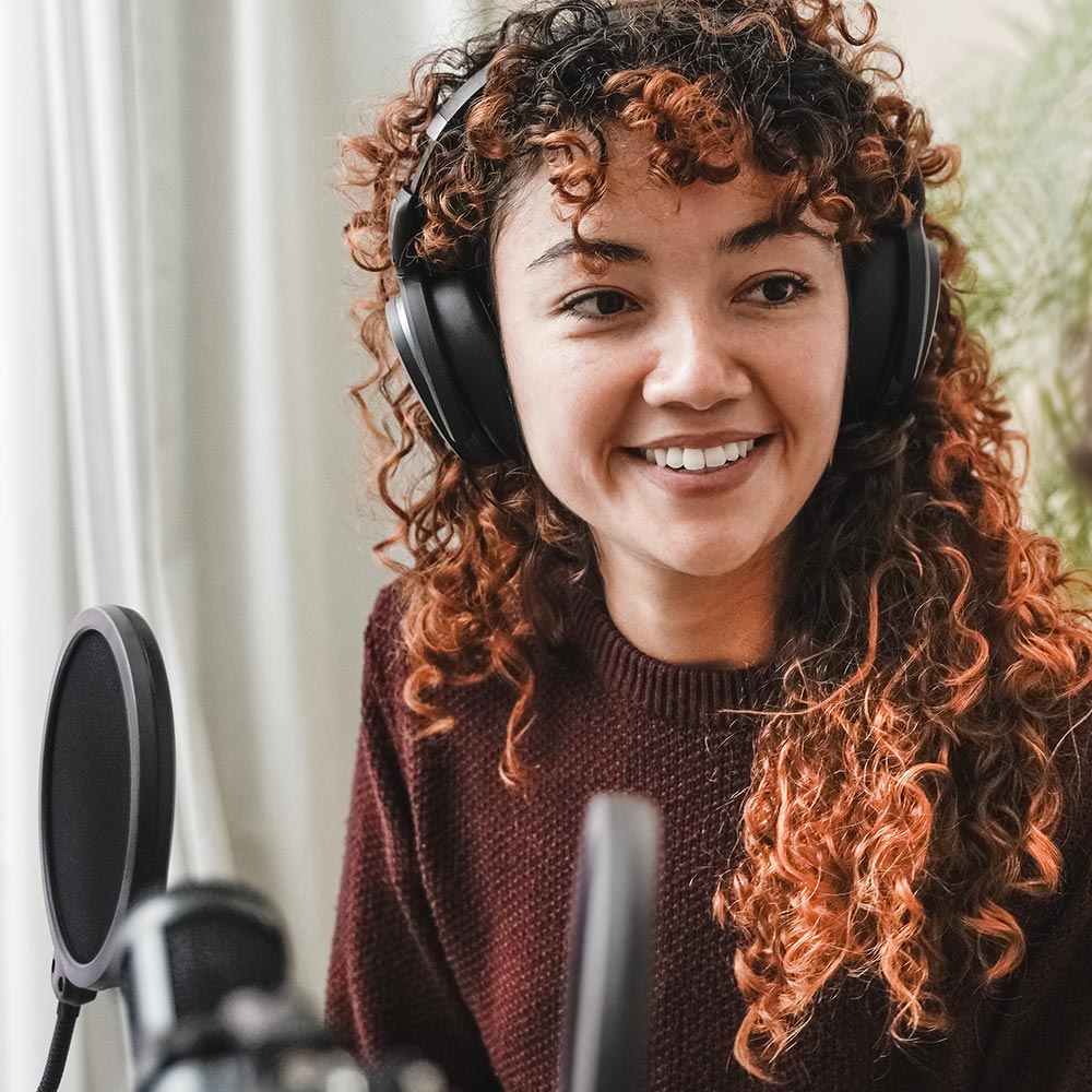 woman recording a podcast