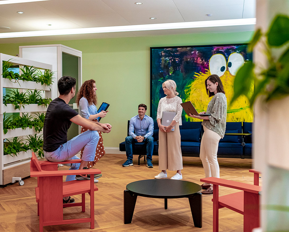 Employees enjoy the Innovation Hub at Quai Zurich Campus
