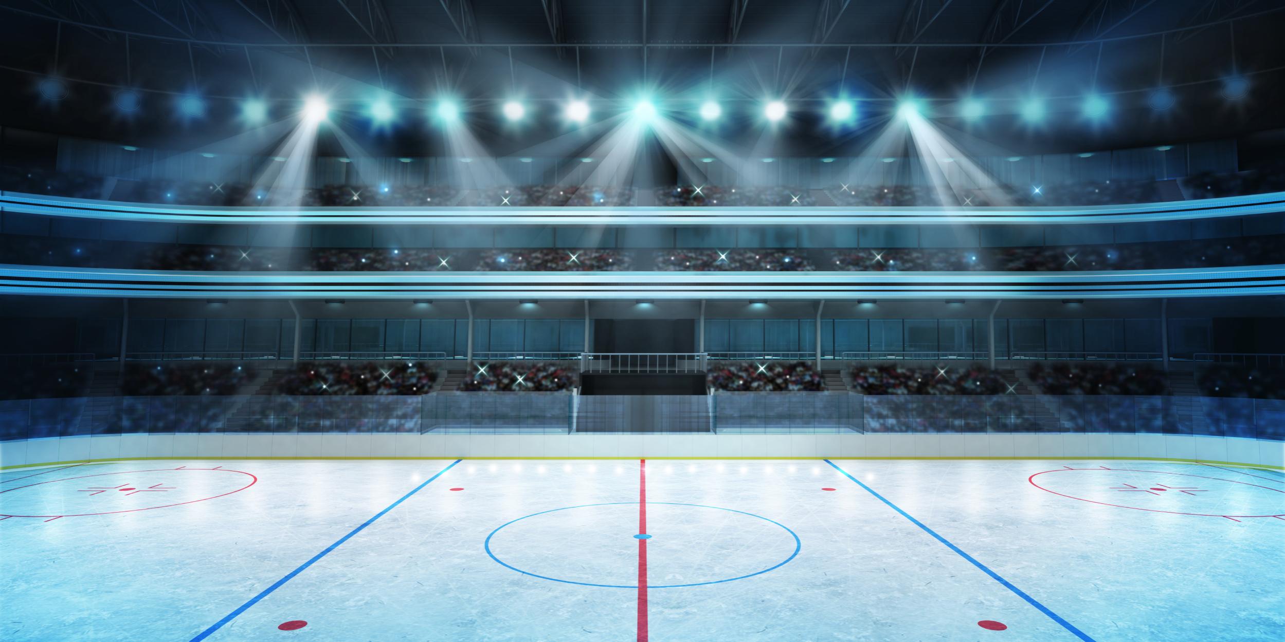 ice hockey player practicing with cones