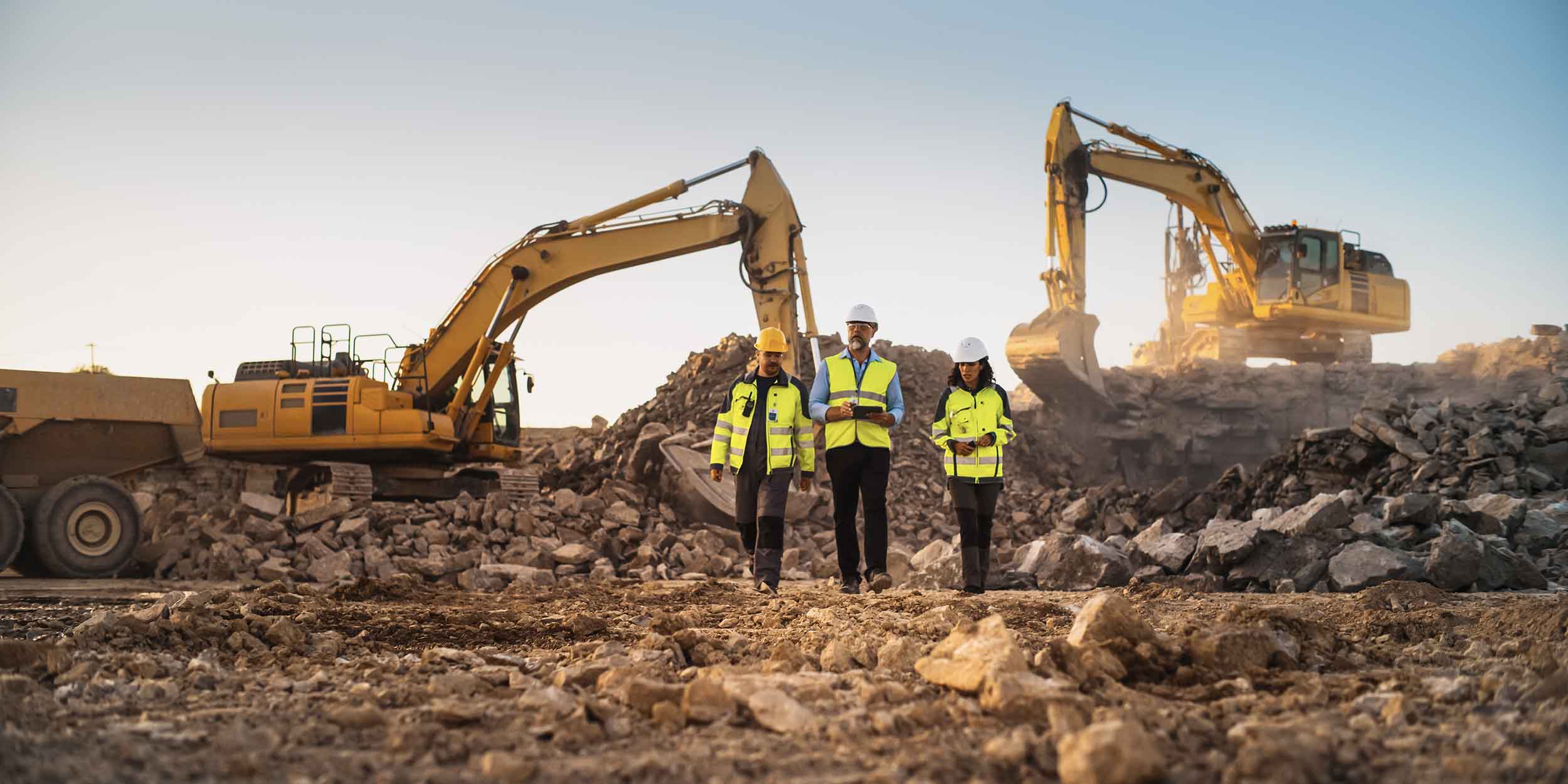Construction Site With Excavators on Sunny Day