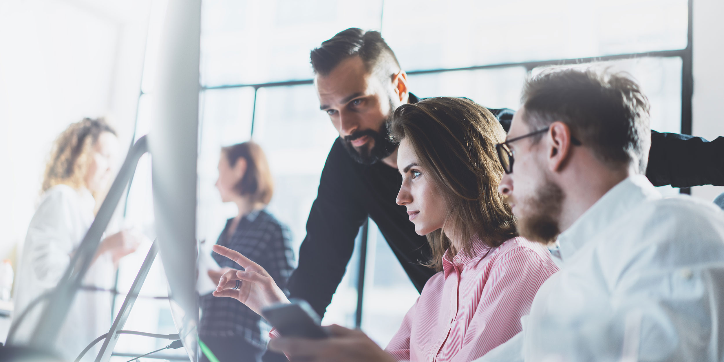 Young professionals work in office