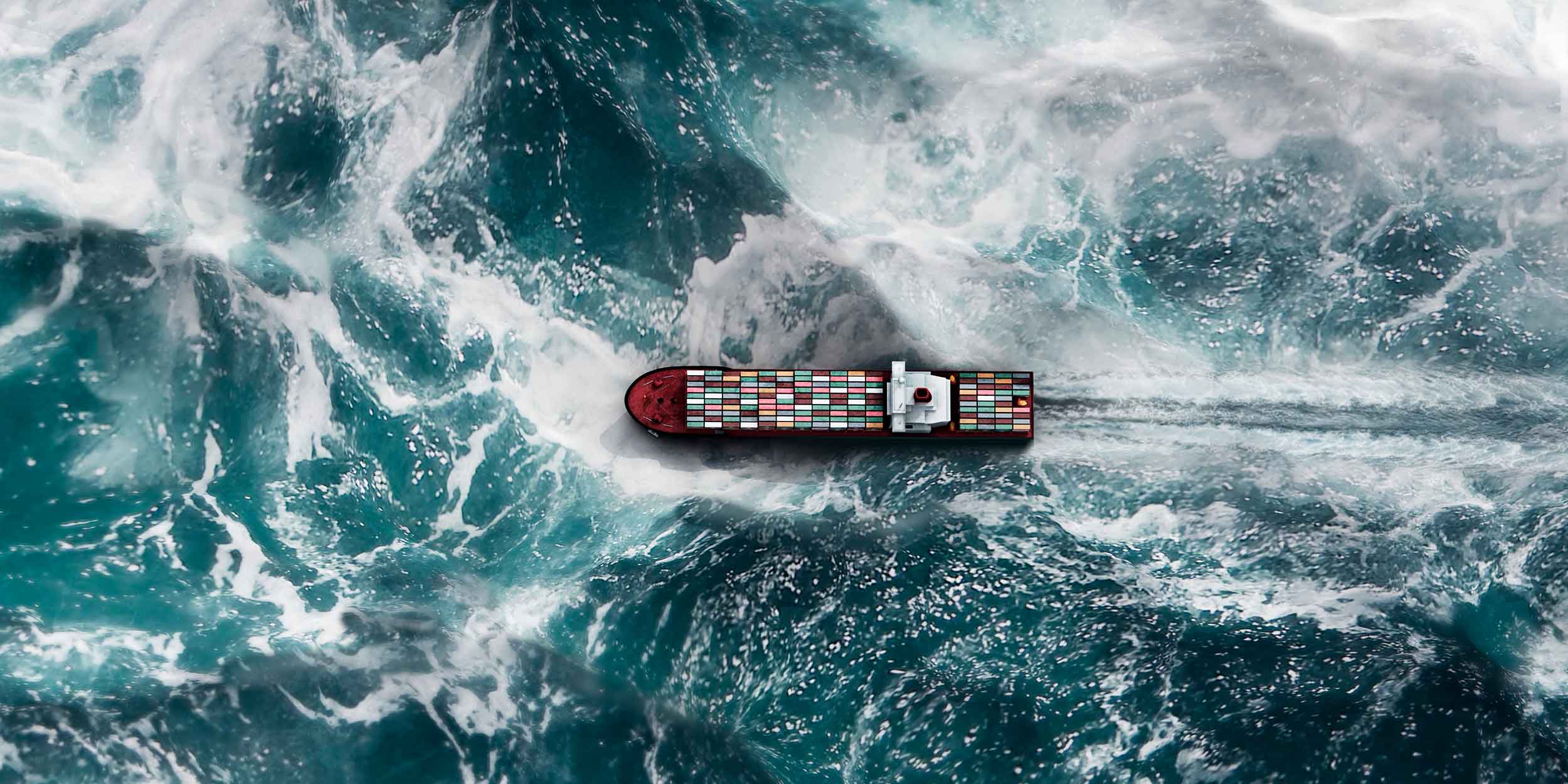 cargo ship on wavy sea
