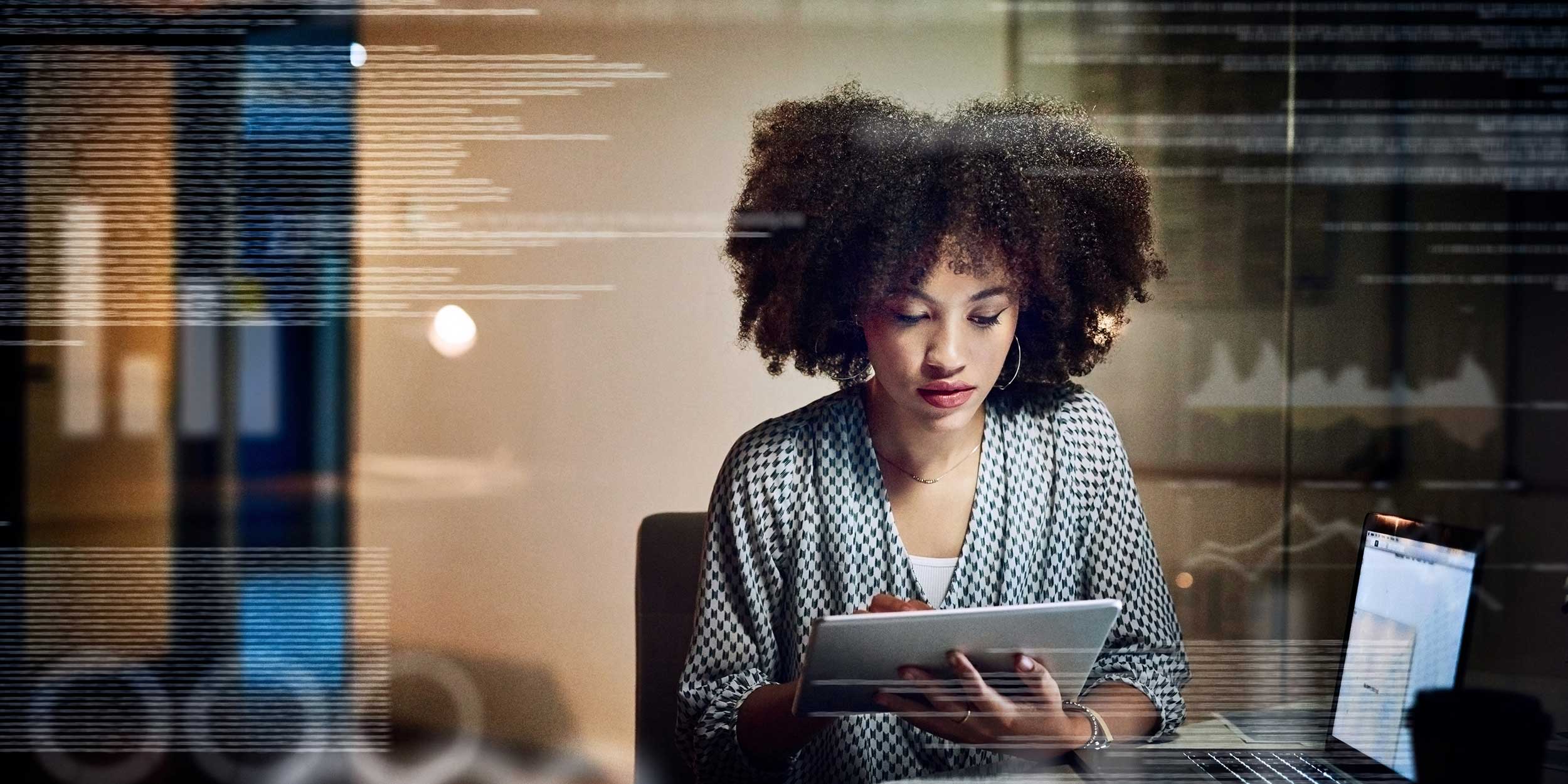 woman working on tablet