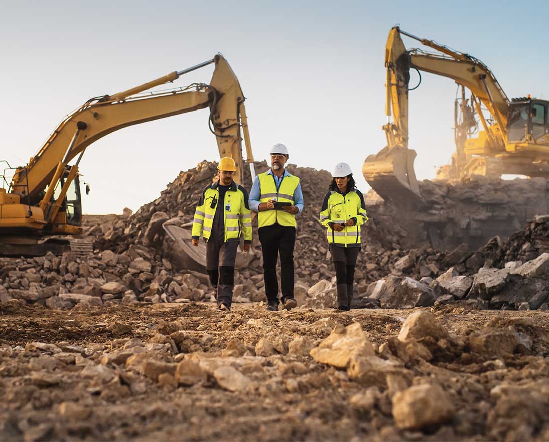 Construction Site With Excavators on Sunny Day