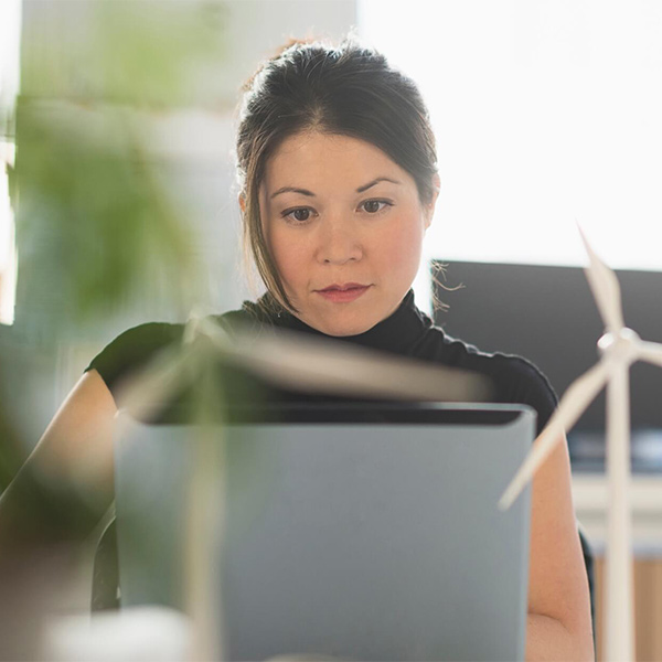 a woman working on a laptop