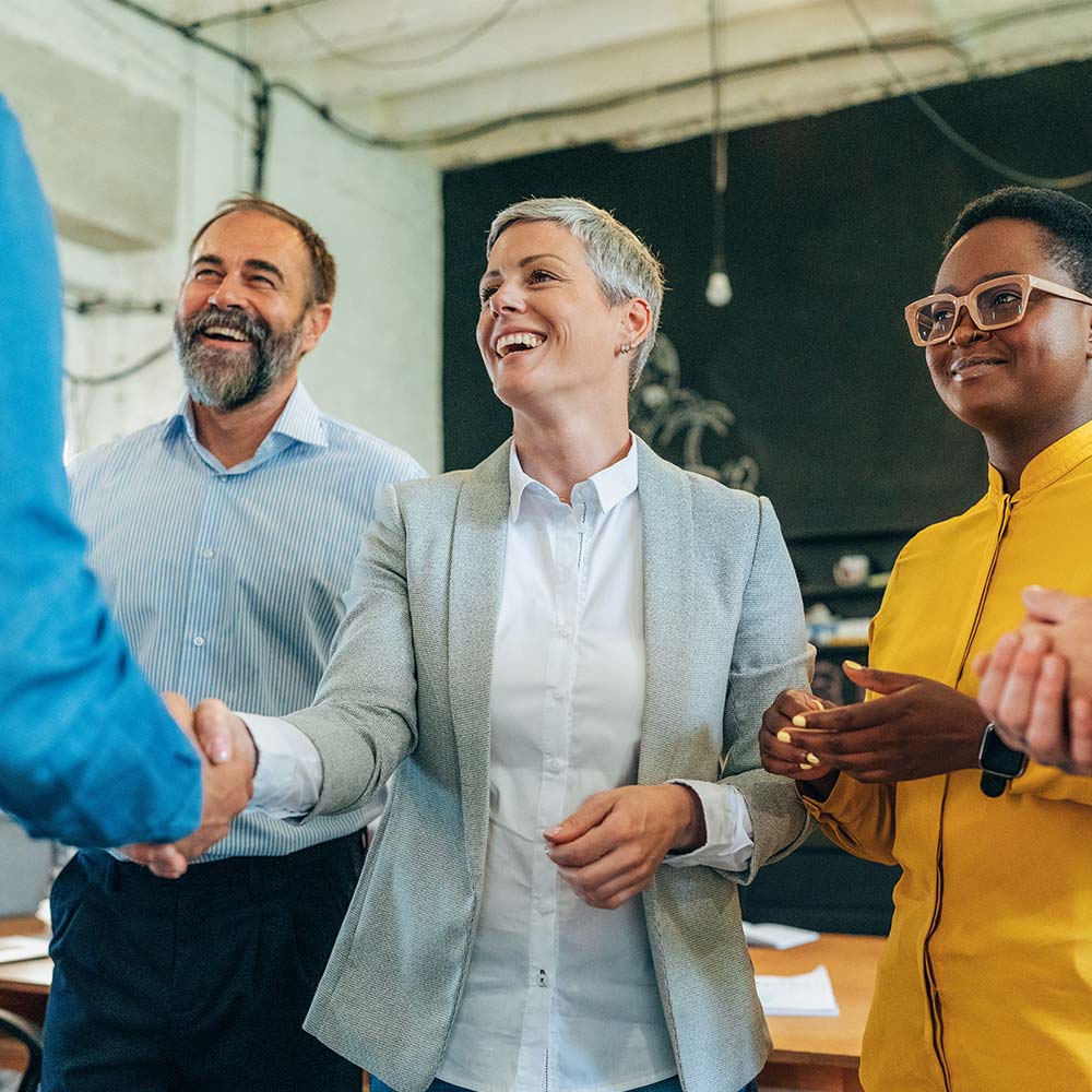 woman shaking a hand