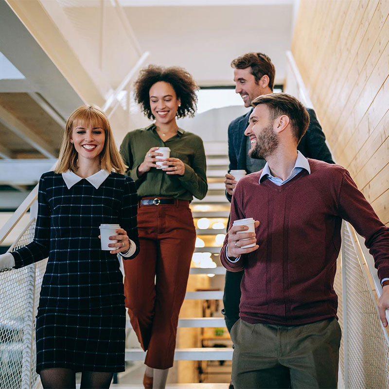 colleagues walking down the stairs together