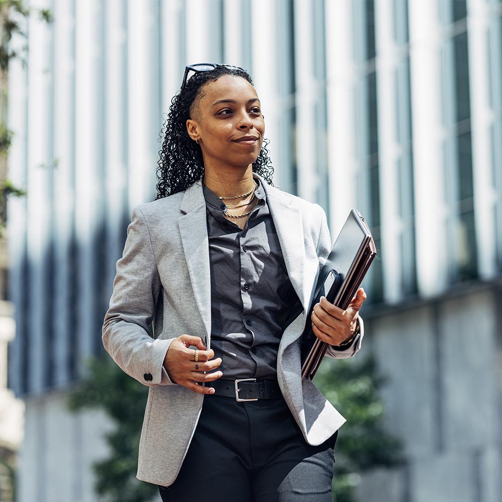 kid pointing at a windmill