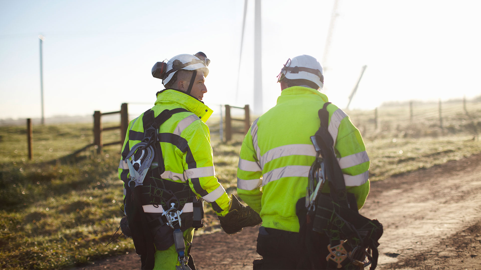 workers with yellow vest walking