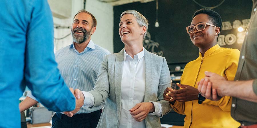 woman shaking a hand