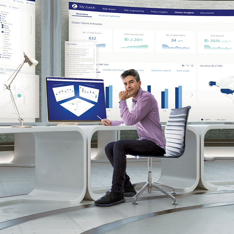 man sitting behind a computer