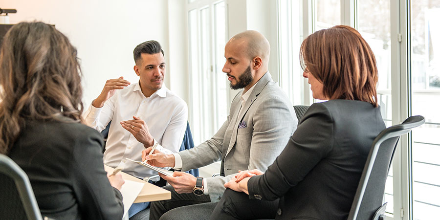 team is discussing in a meeting