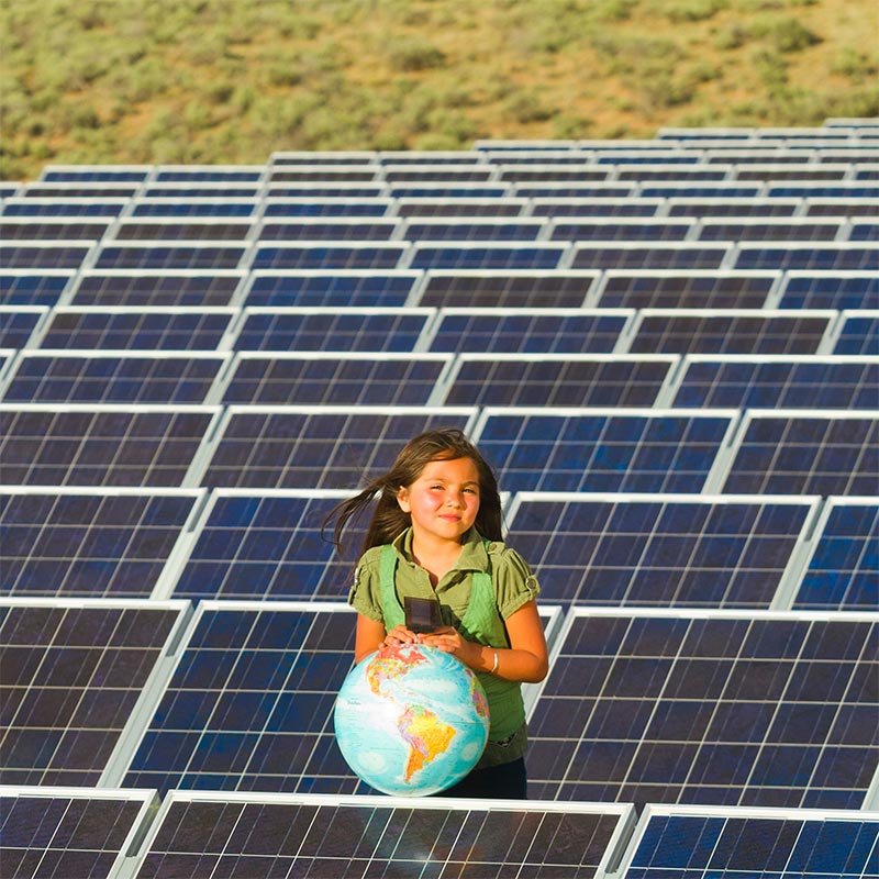 girl holding a globe