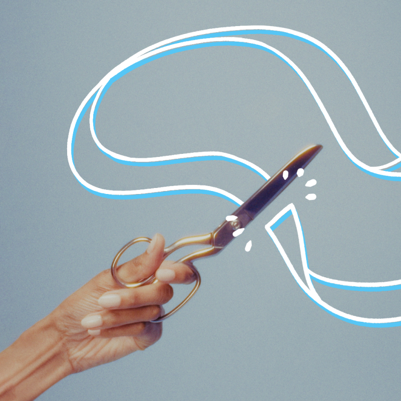 Scissors cutting ribbon