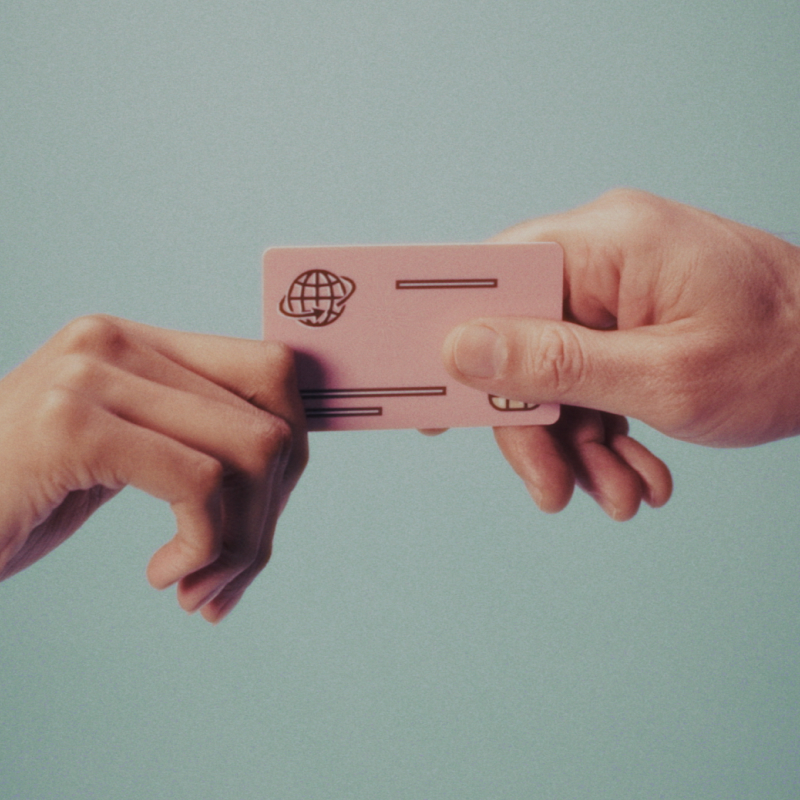 Hands holding credit card