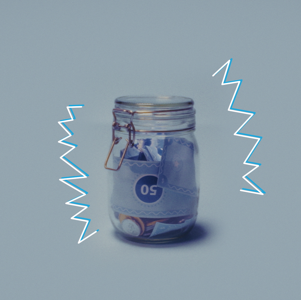 Money jar with savings in cash