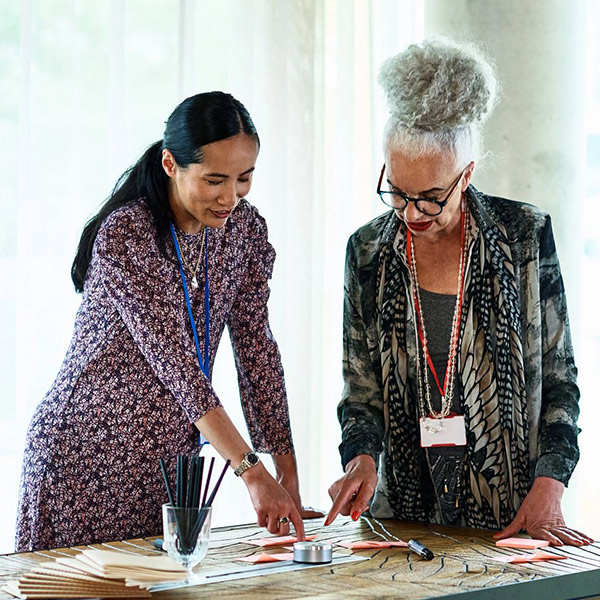 two women in a meeting