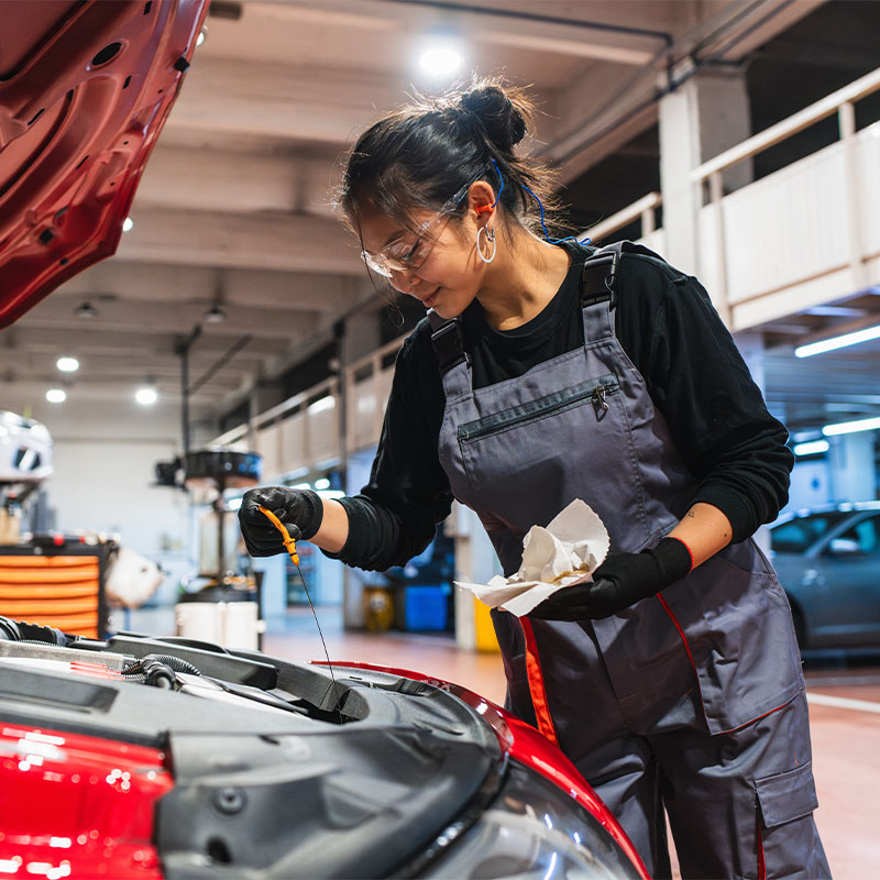 Car mechanic working on a car