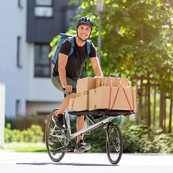 man delivering parcels with bike