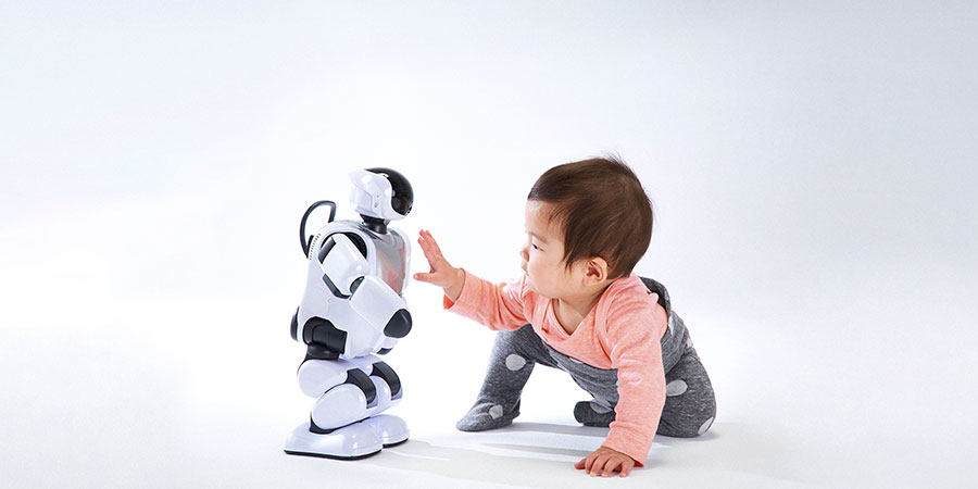 baby with a robot