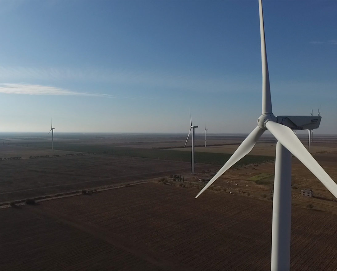 Rotating turbines of a wind farm renewable energy