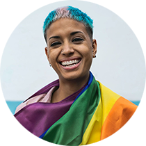 woman with LGBTQ pride flag